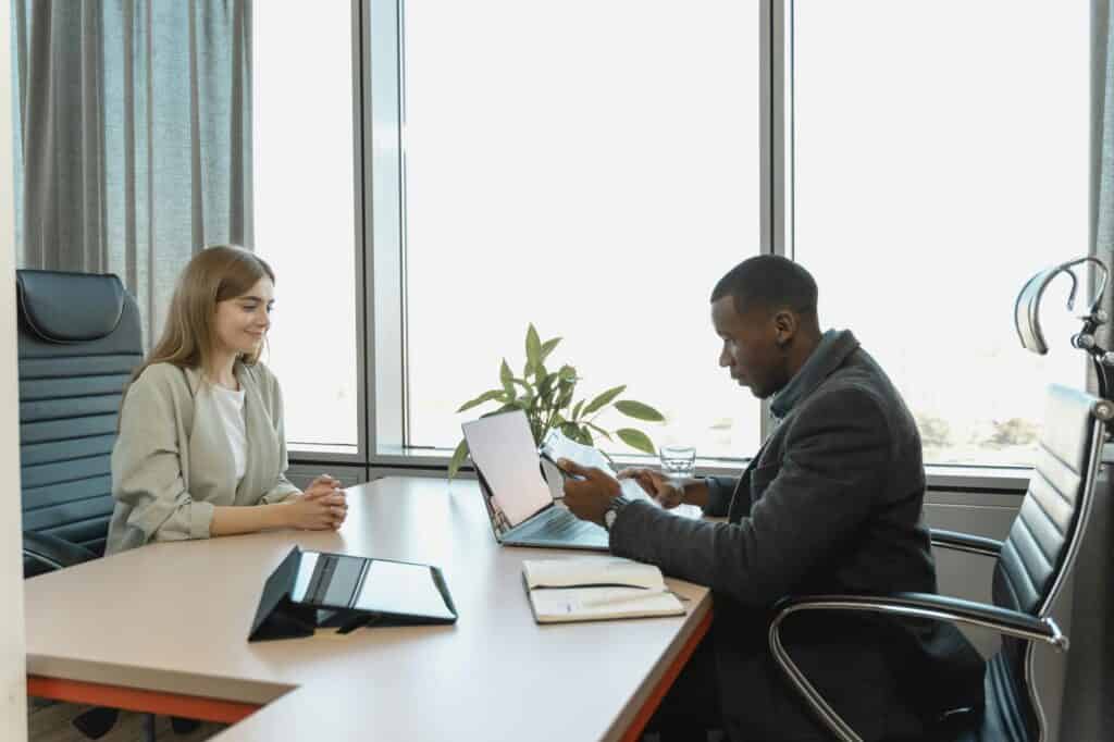 A woman is being interviewed