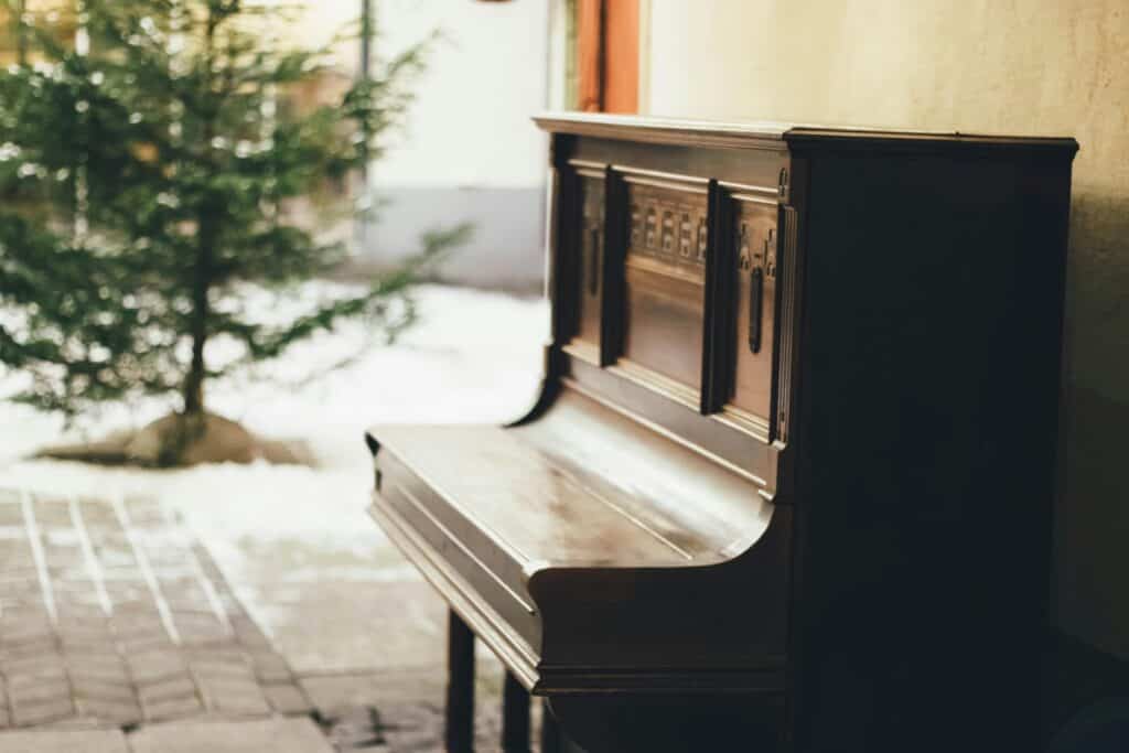 A wooden upright piano