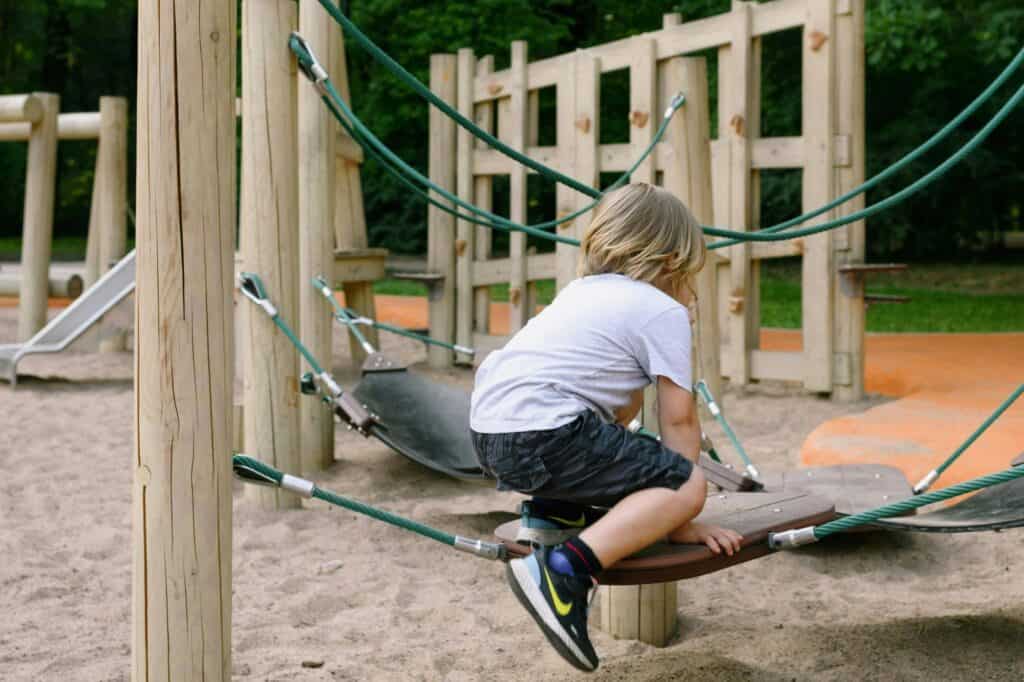 A child is playing in a playground